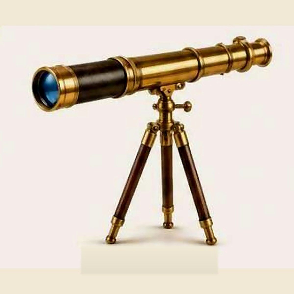 Brass telescope on a wooden tripod, handmade in the Faina Enterprises workshop